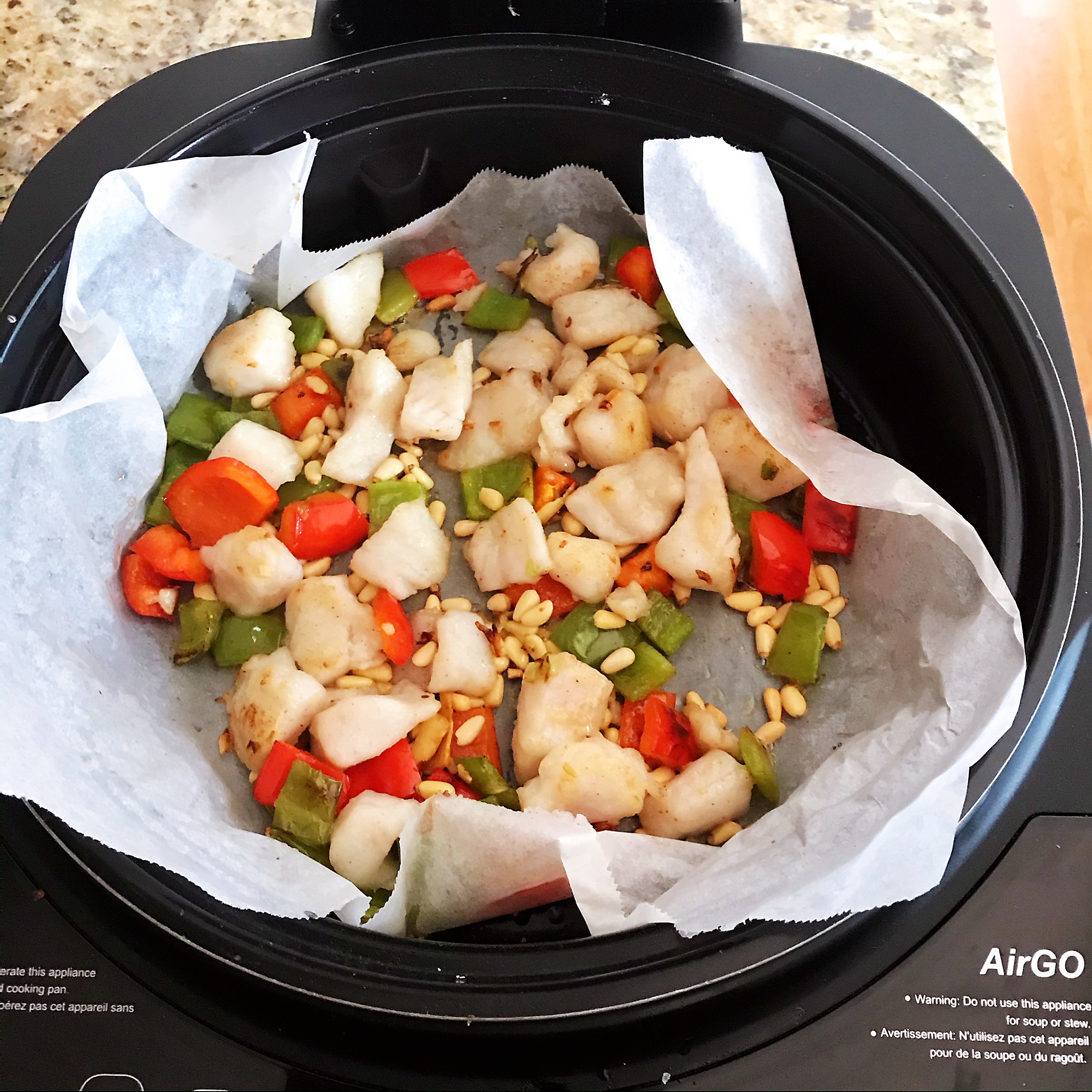 Roasted pine nuts with fish fillets – AirGO recipes by EZCuisine