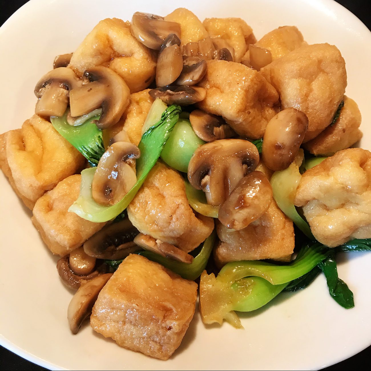 Grilled baby Bok Choy, mushroom and tofu puffs